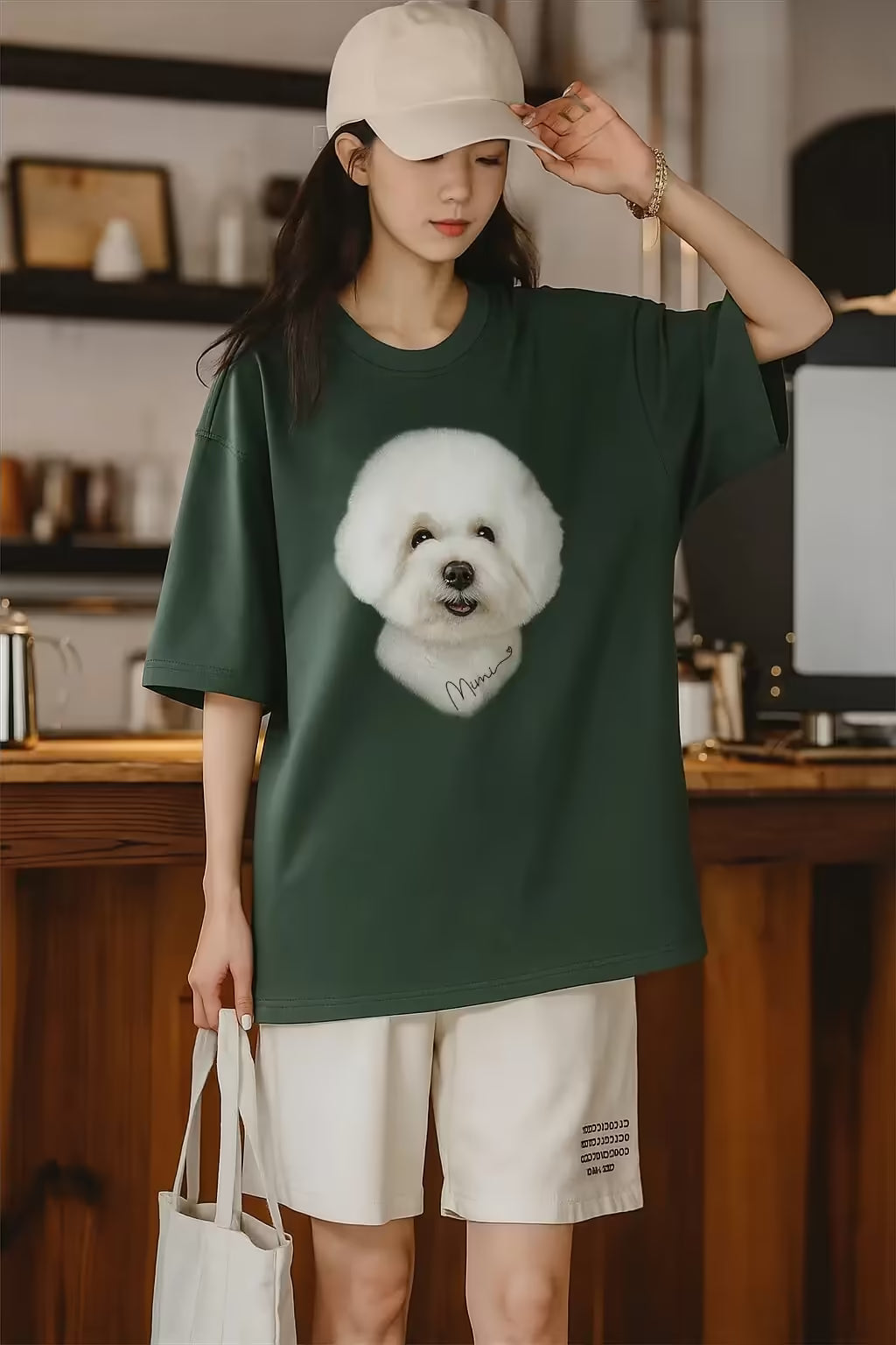 Woman wearing a hyper-realistic custom dog t-shirt with a Bichon Frise portrait.
